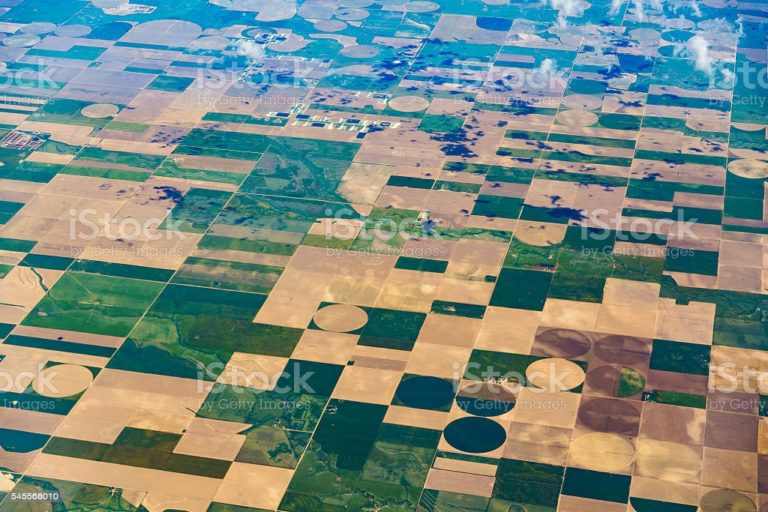 Aerial view to patchwork's fields in middle Kansas state, USA, North America.