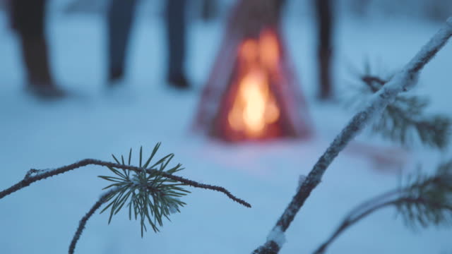 4K footage of a campfire with a traditional tent in Swedish Lapland.